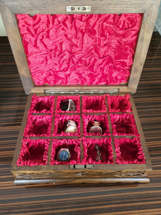 Wooden watch box with drawers and intricate hand-carved designs