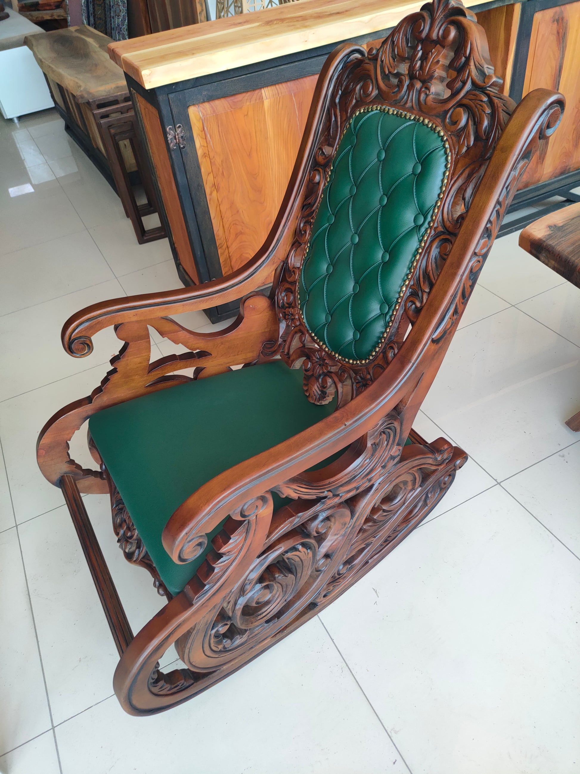 Side view of rococo-style rocking chair